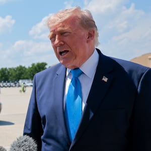 President Donald Trump speaks to reporters after arriving on Air Force One on May 20, 2026 back at Joint Base Andrews, Maryland.