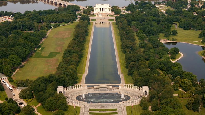 Algae can be seen at the bottom of the reflecting pool in this June aerial image.