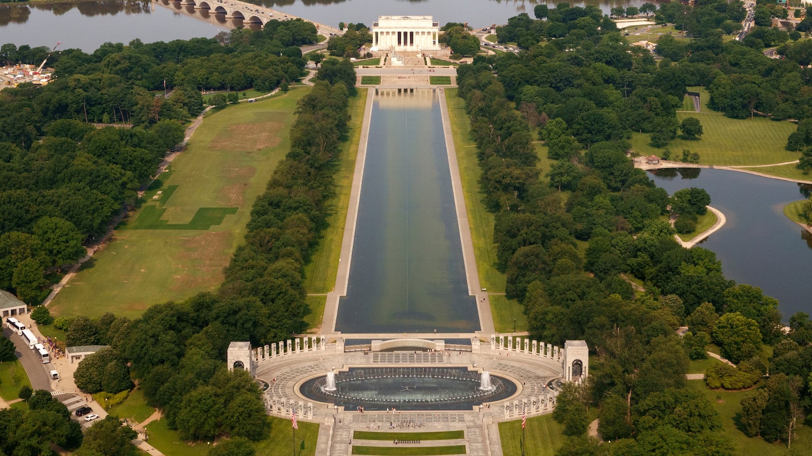 Algae can be seen at the bottom of the reflecting pool in this June aerial image.