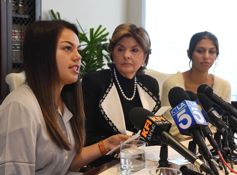 Attorney Gloria Allred (C) with University of Southern California (USC) students Daniella Mohazab (L) and Anika Narayanan (R).