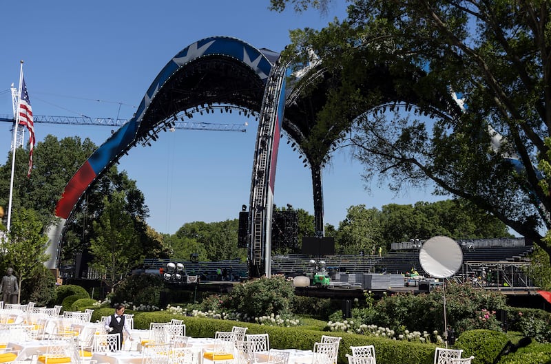 The arena for the upcoming UFC match on the South Lawn is seen as workers setup the Rose Garden for an evening event at the White House on June 3.