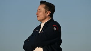 TOPSHOT - Elon Musk steps off Air Force One upon arrival at Morristown Municipal Airport in Morristown, New Jersey, on March 22, 2025. US President Donald Trump will be spending the weekend at Trump National Golf Club in Bedminster, New Jersey. (Photo by Brendan SMIALOWSKI / AFP) (Photo by BRENDAN SMIALOWSKI/AFP via Getty Images)