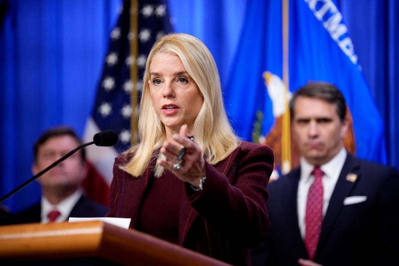 WASHINGTON, DC - NOVEMBER 19: Attorney General Pam Bondi, accompanied by Deputy Attorney General Todd Blanche (R), speaks during a news conference at the Justice Department on November 19, 2025 in Washington, DC. The Justice Department announced a fifteen million dollar reward for information leading to the arrest of Ryan James Wedding, the leader of an international criminal drug organization who smuggled large quantities of cocaine from through Columbia and Mexico for distribution in the United States and Canada. (Photo by Andrew Harnik/Getty Images)