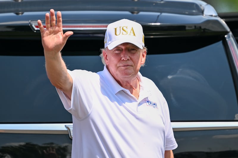 Aug 9, 2026; Bedminster, New Jersey, USA; President Donald Trump waves to the fans during the final round of the LIV Golf New York tournament at Trump National Bedminster. Mandatory Credit: Dennis Schneidler-Imagn Images