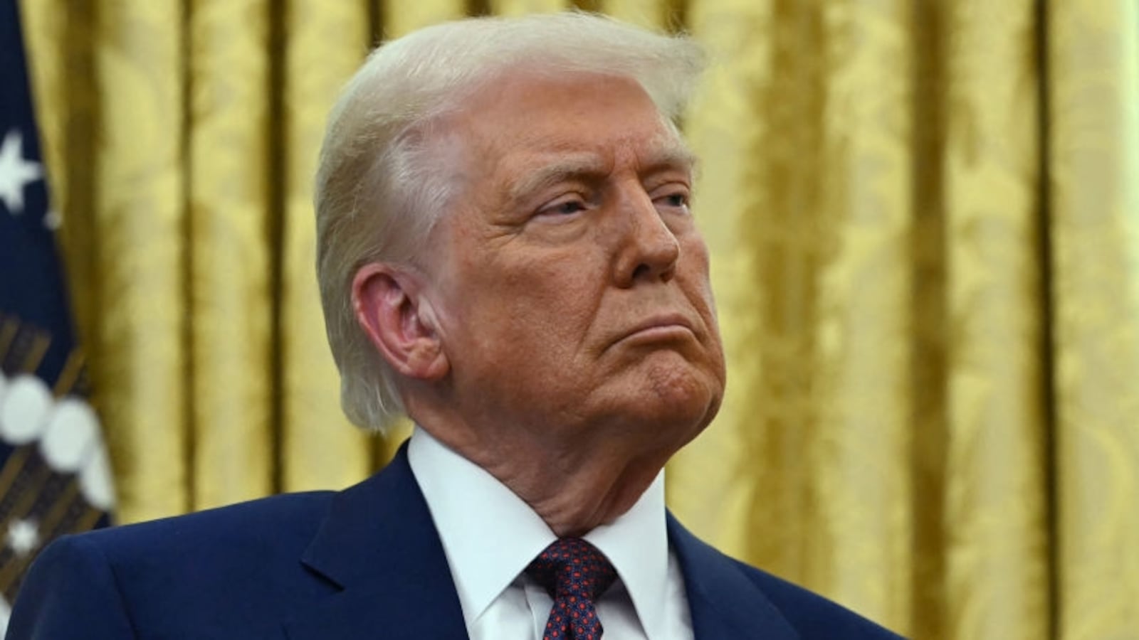 President Donald Trump listens as the new US Secretary of Health and Human Services Robert F. Kennedy Jr., speaks after being sworn in at the Oval Office of the White House in Washington, DC, on February 13, 2025.