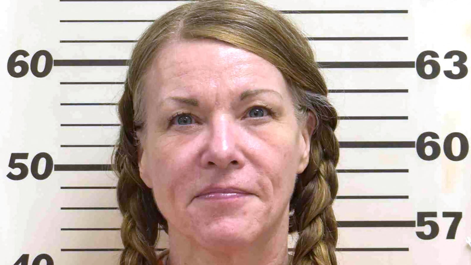 Doomsday Mom Lori Daybell poses for booking photo after being found guilty of killing her two children and her husband’s ex-wife, Tammy Daybell.