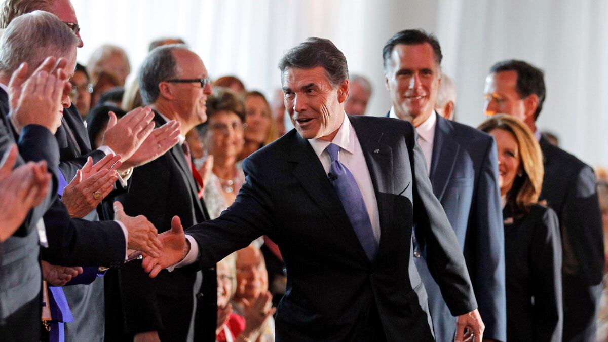 articles/2011/09/08/rick-perry-unveils-smash-mouth-debate-style-at-reagan-library/gop-debate-wrap-avlon_ccis9q