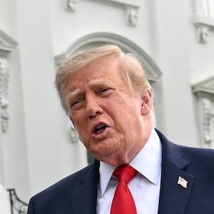 President Donald Trump speaks to the media as he departs the White House on the South Lawn in Washington, DC, US, September 26, 2026. REUTERS/Annabelle Gordon