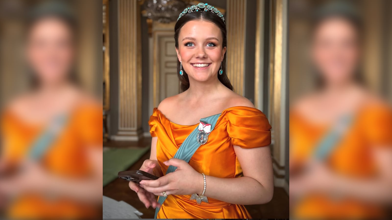 Princess Isabella, with phone.