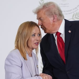 SHARM EL SHEIKH, EGYPT - OCTOBER 13: U.S. President Donald Trump (R) greets Italy's Prime Minister Giorgia Meloni during a summit of European and Middle Eastern leaders on October 13, 2025 in Sharm El Sheikh, Egypt. President Trump is in Egypt to meet with European and Middle Eastern leaders in what’s being billed as an international peace summit, following the start of a US-brokered ceasefire deal to end the war in the Gaza Strip. (Photo by Evan Vucci - Pool/Getty Images)