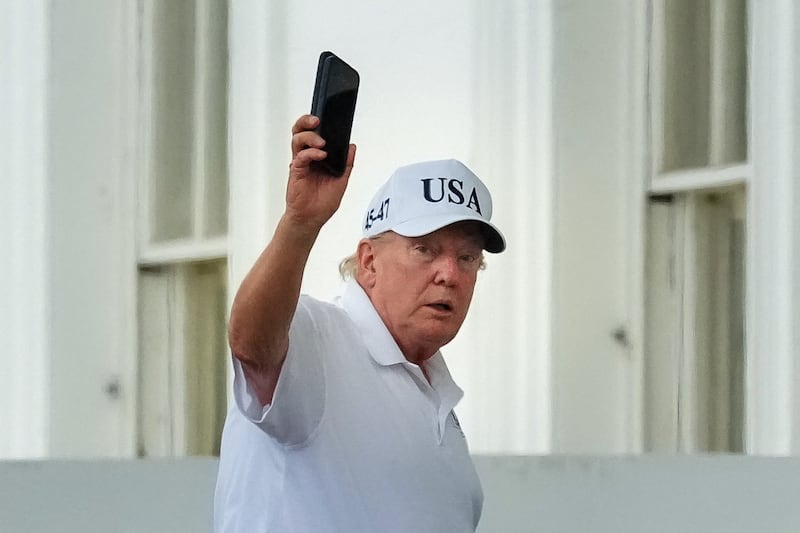 U.S. President Donald Trump gestures as he enters the White House, in Washington, D.C., U.S., June 28, 2026.
