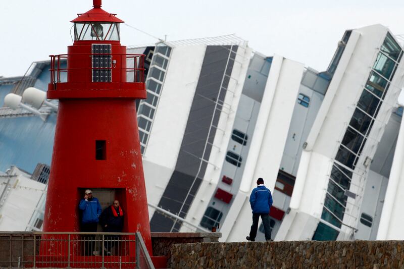 articles/2012/02/22/8-more-bodies-found-on-shipwrecked-italian-cruise-ship/ghosts-concordia-nadeau_n2knze