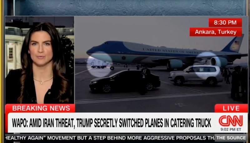 The catering truck is shown on the far left, leaving Air Force One behind.