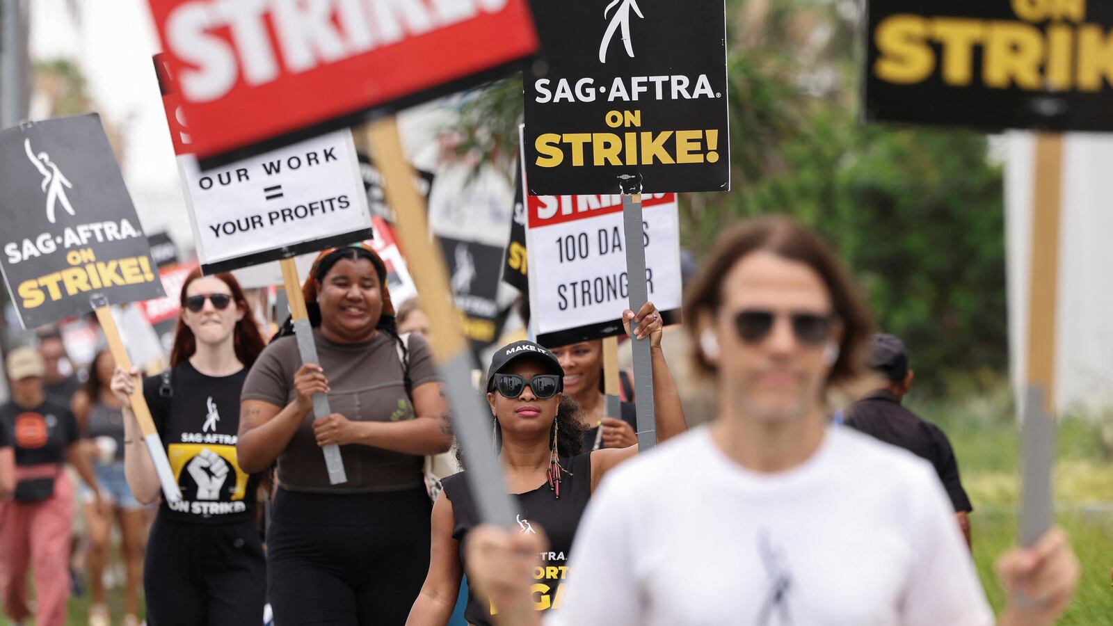 SAG-AFTRA actors and Writers Guild of America (WGA) writers walk the picket line in L.A.