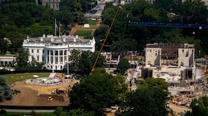 Construction continues on a new helipad on the South Lawn of the White House and the East Wing ballroom on August 24, 2026, in Washington, DC.