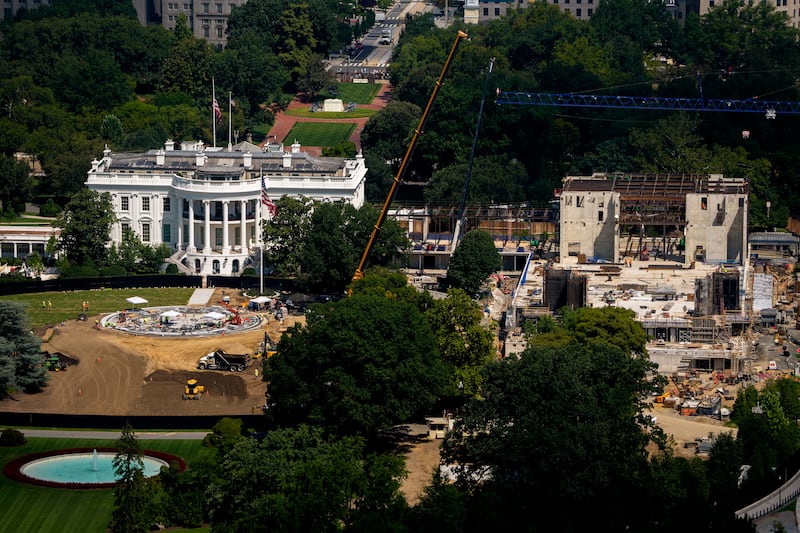 Construction continues on a new helipad on the South Lawn of the White House and the East Wing ballroom on August 24, 2026, in Washington, DC.