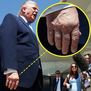 A photo illo of Donald Trump's hand as he speaks to reporters after departing Air Force One on May 20, 2026 at Joint Base Andrews, Maryland.