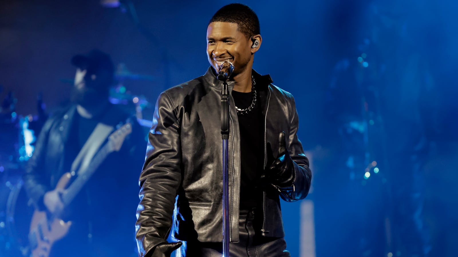 Usher singing.