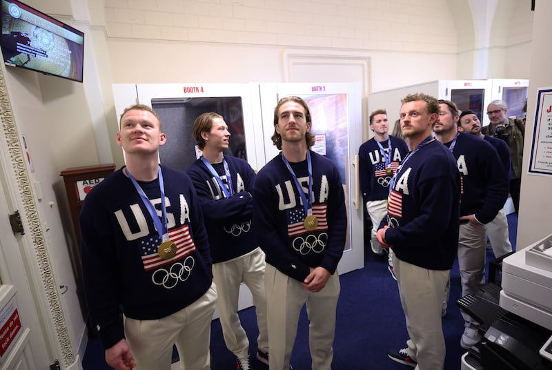 WASHINGTON, DC - FEBRUARY 24: Members of the U.S. Olympic gold medal hockey team wait backstage ahead of the State of the Union address during a Joint Session of Congress at the U.S. Capitol on February 24, 2026, in Washington, DC. Trump delivered his address days after the Supreme Court struck down the administration's tariff strategy and amid a U.S. military buildup in the Persian Gulf threatening Iran. (Photo by Kevin Dietsch/Getty Images)