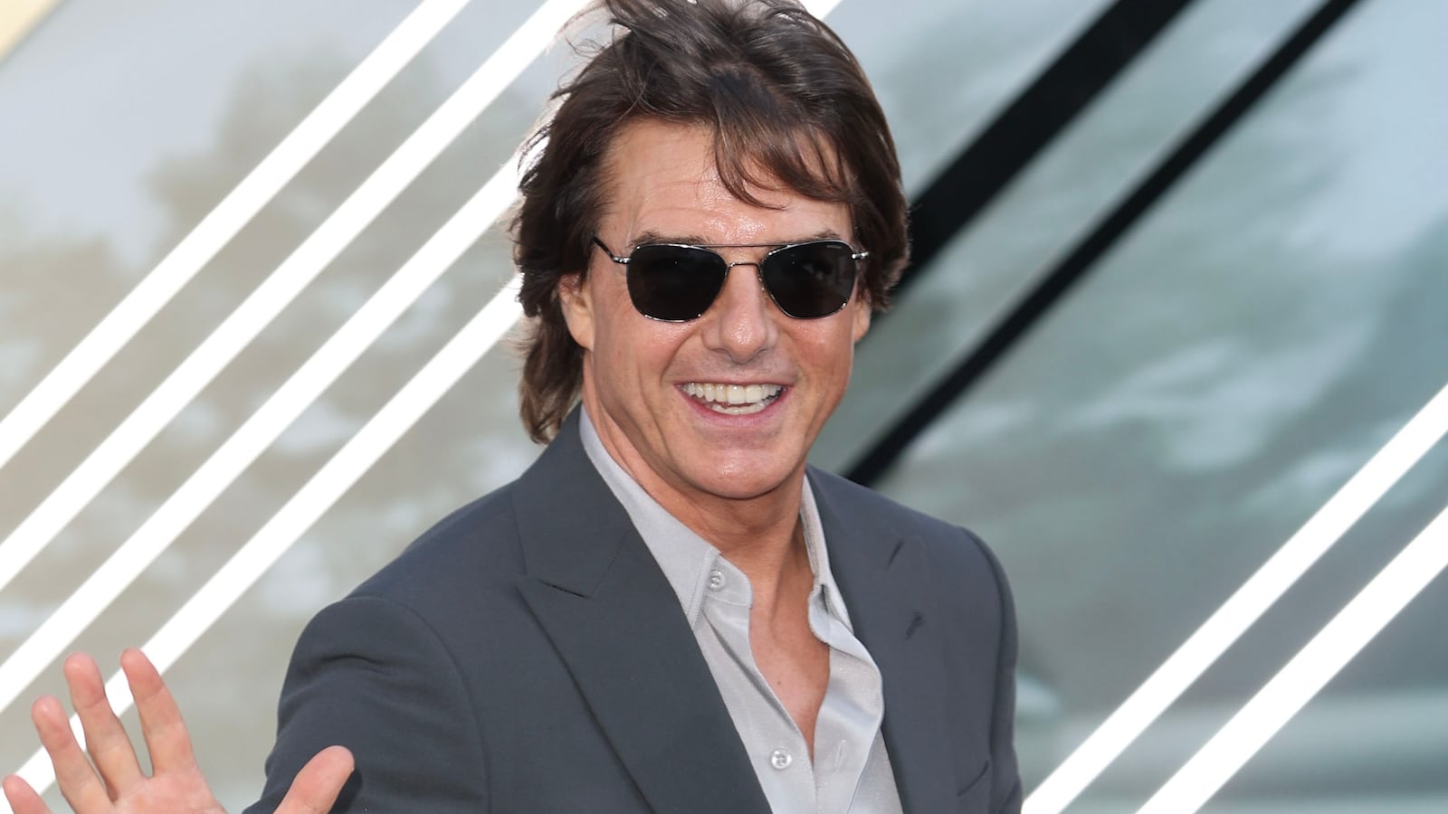 Tom Cruise on a red carpet.