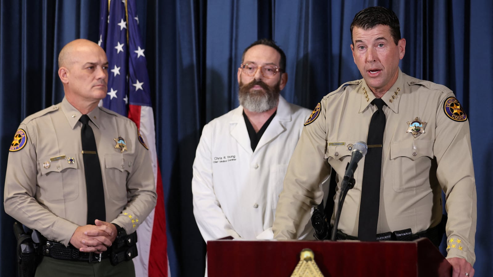 Sheriff Jim Fryhoff speaks at a press conference in uniform.