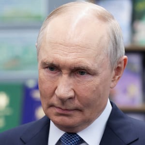 Russian President Vladimir Putin attends a meeting