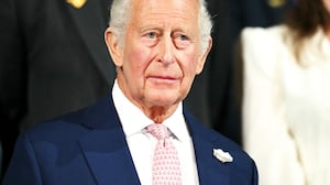 Britain's King Charles III stands for the national anthem during the opening ceremony of the 23rd Commonwealth Games