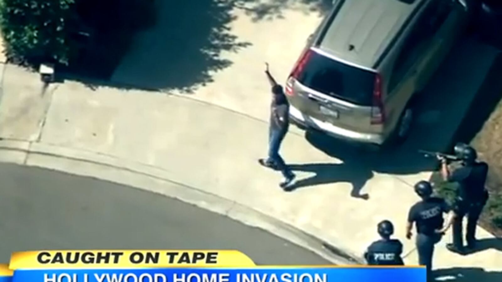 articles/2012/10/05/ashton-kutcher-miley-cyrus-others-terrorized-in-dangerous-swatting-prank/swatting-ashton-kutcher-video-tease_wafuku