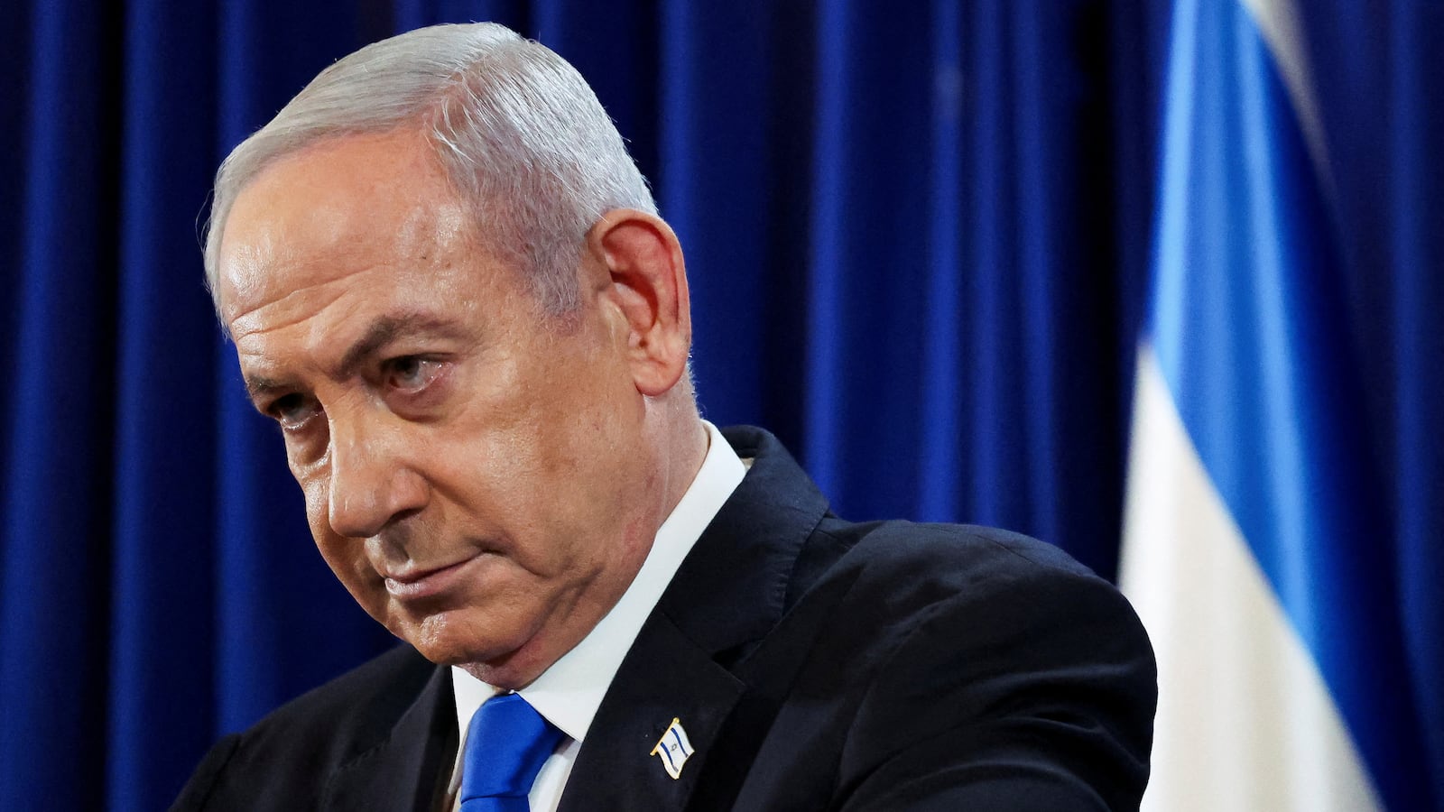 Israeli Prime Minister Benjamin Netanyahu pauses during a press conference amid the ongoing conflict in Gaza between Israel and Hamas, in Tel Aviv, Israel, July 13, 2024.
