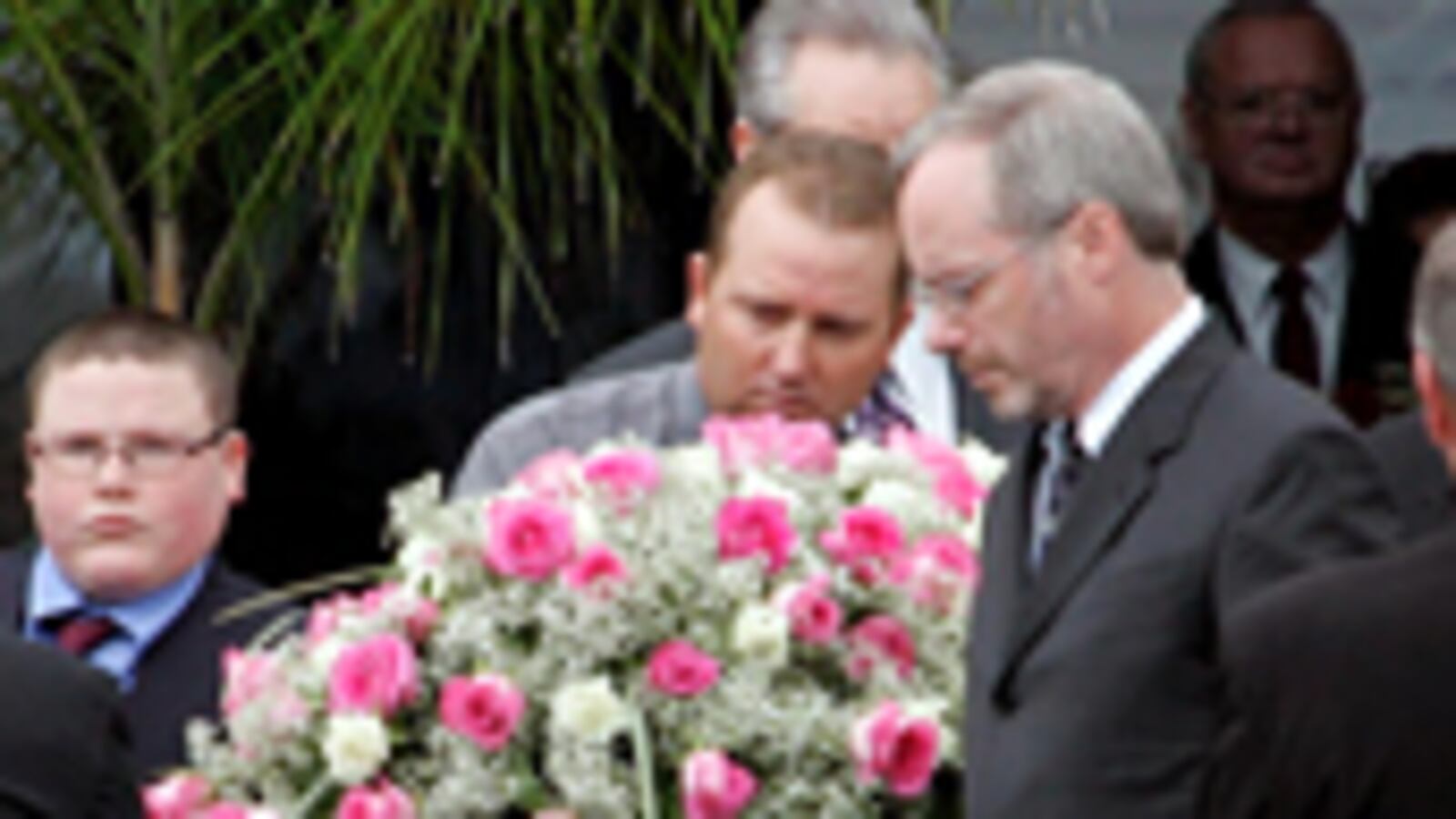 articles/2009/07/21/florida-murders-a-contract-hit/outzen-florida-murders-billings-funeral_38928_o3k0rf