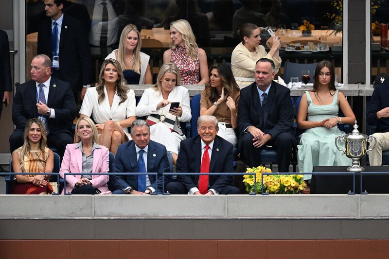 U.S. President Donald Trump front 1st R watches the men's singles final match between Carlos Alcaraz of Spain and Jannik Sinner of Italy at the 2025 US Open tennis championships in New York, the United States, Sept. 7, 2025. (Photo by Li Rui/Xinhua via Getty Images)