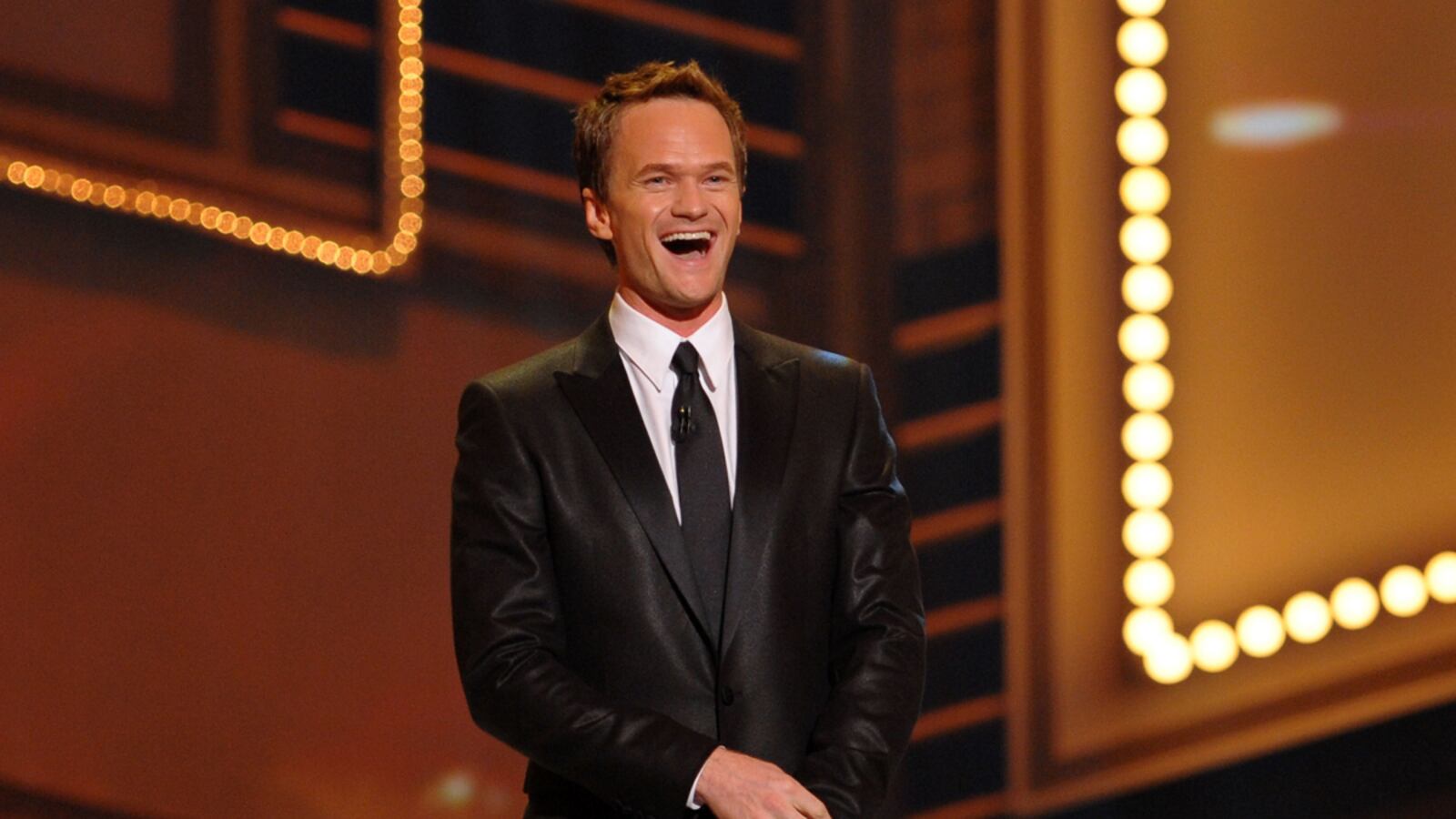 articles/2011/06/13/tony-awards-2011-book-of-mormon-neil-patrick-harris-daniel-radcliffe-and-more-best-moments/tony-awards-neil-patrick-harris-sessums_f90k51