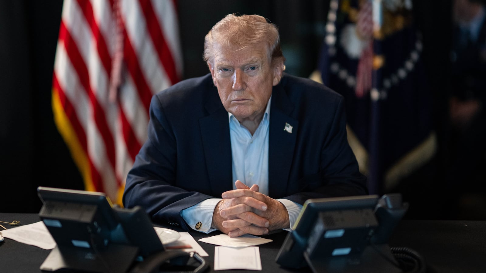 WASHINGTON DC, USA - MARCH 02: (----EDITORIAL USE ONLY â" MANDATORY CREDIT - 'THE WHITE HOUSE'S X ACCOUNT / HANDOUT' - NO MARKETING NO ADVERTISING CAMPAIGNS - DISTRIBUTED AS A SERVICE TO CLIENTS----) U.S. President Donald J. Trump sits at a table monitoring military operations during Operation Epic Fury against Iran, with U.S. flags visible behind him, in Washington, United States, on March 02, 2026. (Photo by The White House via X Account/Anadolu via Getty Images)