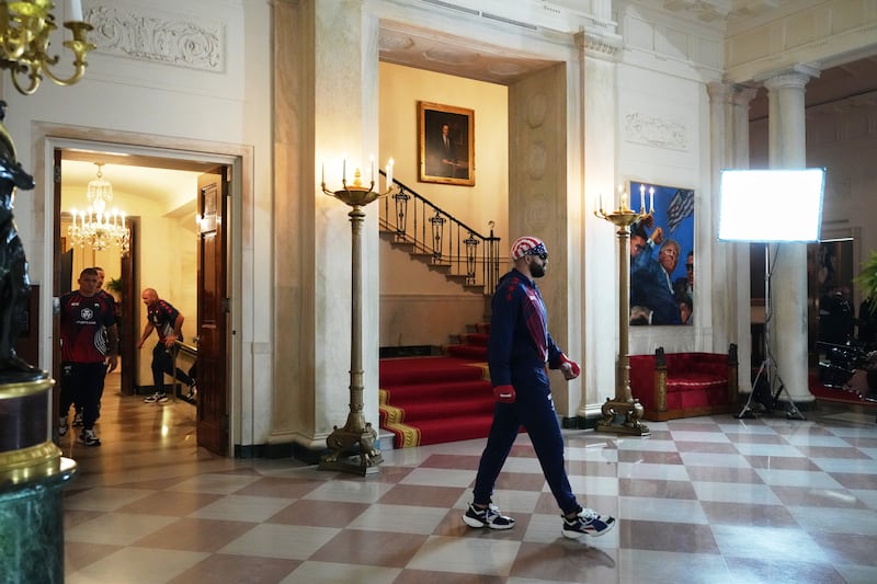 America's mixed martial artist Josh Hokit walks through the Grand Foyer of the White House before his heavyweight bout with America's mixed martial artist Derrick Lewis, during UFC Freedom 250 on the South Lawn of the White House, in Washington, DC, on June 14, 2026.