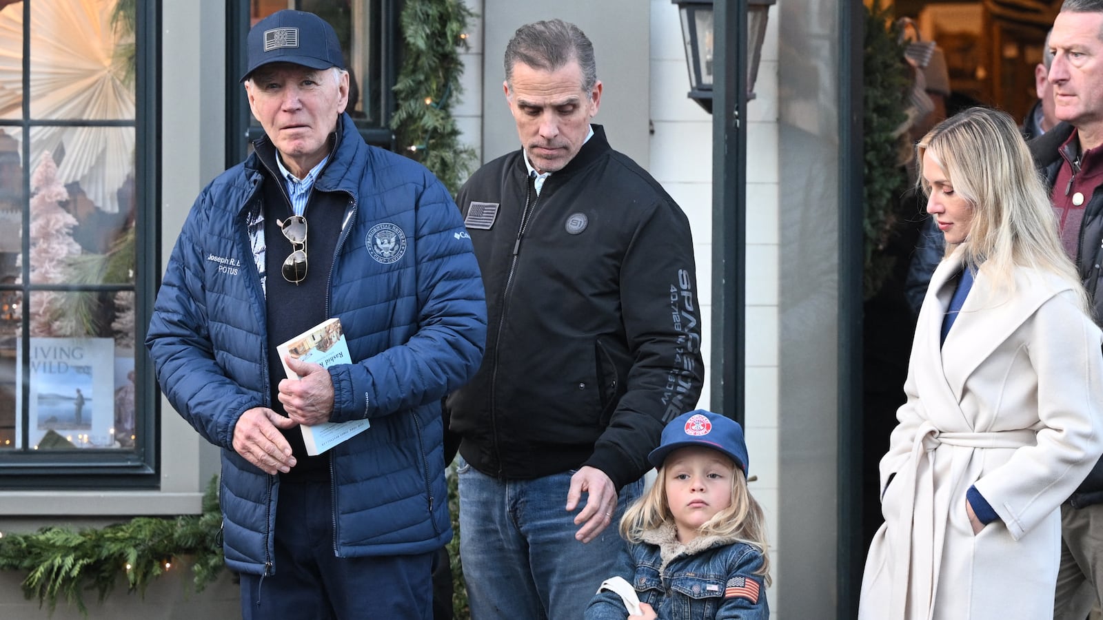 US President Joe Biden (L) walks out of Nantucket Bookworks with son Hunter Biden, grandson Beau and daughter-in-law Melissa Cohen Biden in Nantucket, Massachusetts, on November 29, 2024. Biden holds the book "The Hundred Years' War on Palestine" by Rashid Khalidi. Biden and family are in Nantucket, Massachusetts, for the Thanksgiving holiday.