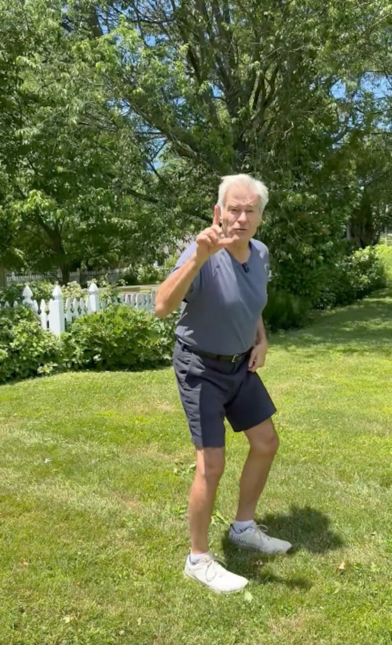 Oz prepares to show proper squatting form. Unfortunately, it wasn't textbook.