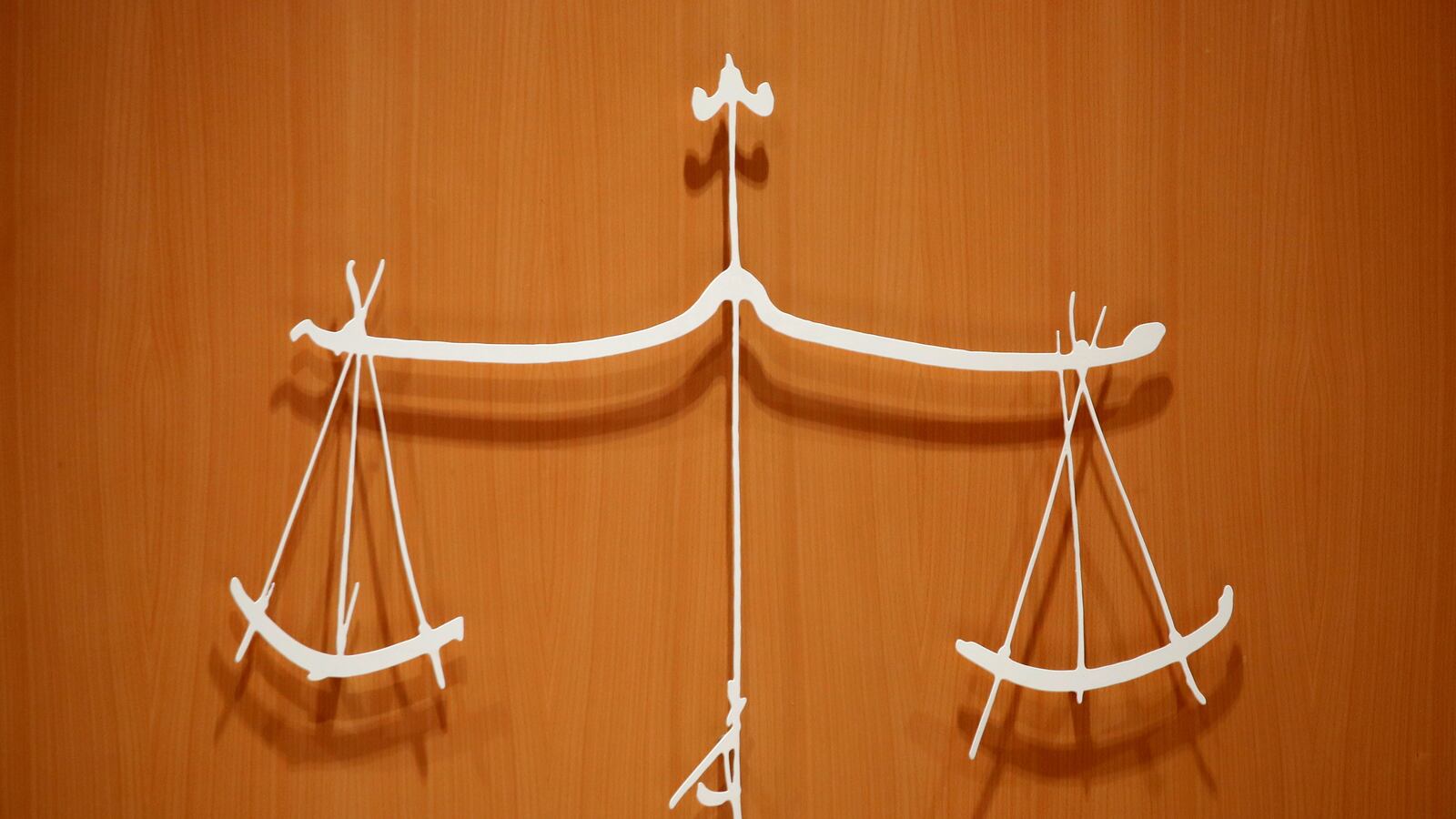 The symbol of Justice, with the sword and the scales.