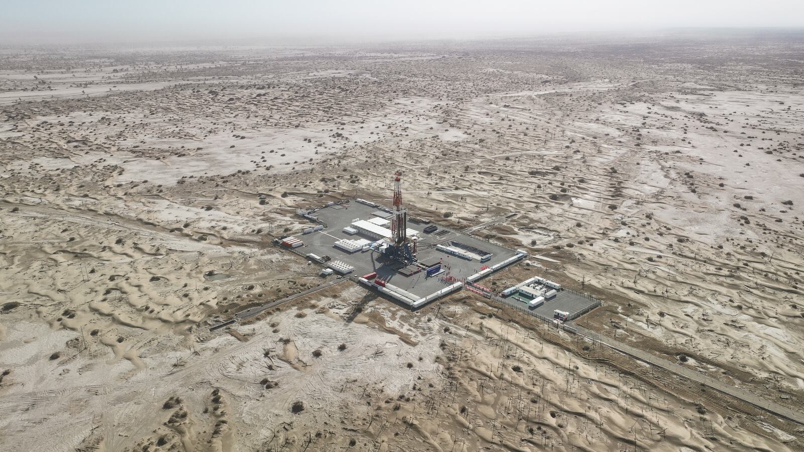 This aerial photo taken on May 30, 2023 shows the drilling project of a borehole over 10,000 meters deep for scientific exploration in northwest China's Xinjiang Uygur Autonomous Region.