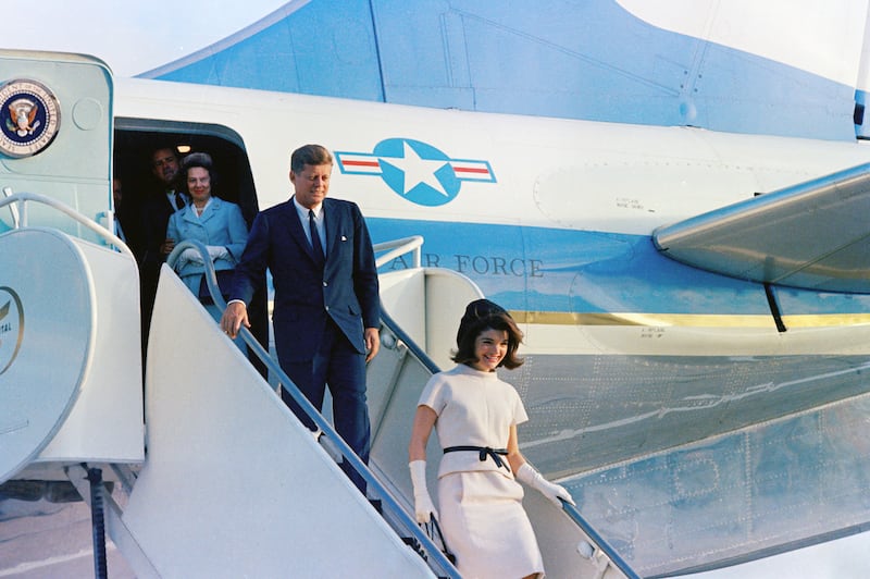 U.S. President John F. Kennedy and U.S. First Lady Jacqueline Kennedy exit Air Force One.