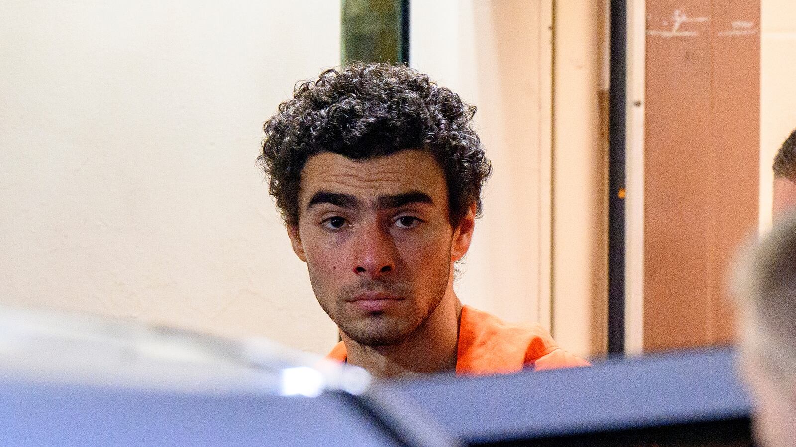 Protesters gathered outside a courthouse where Luigi Mangione faced hearings related to the death of UnitedHealthcare CEO Brian Thompson.