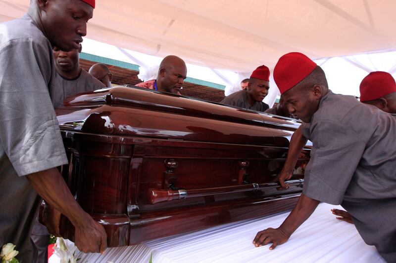 galleries/2013/05/23/laying-to-rest-literary-giant-chinua-achebe/130523-achebe-coffin_drbn1n