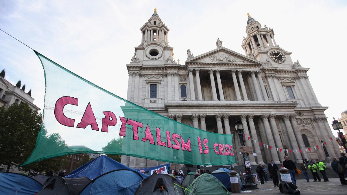 cheats/2011/10/27/st-paul-s-priest-resigns-over-occupy-london/st-pauls-cathedral-closes-protests-london-cheat_arr7ke