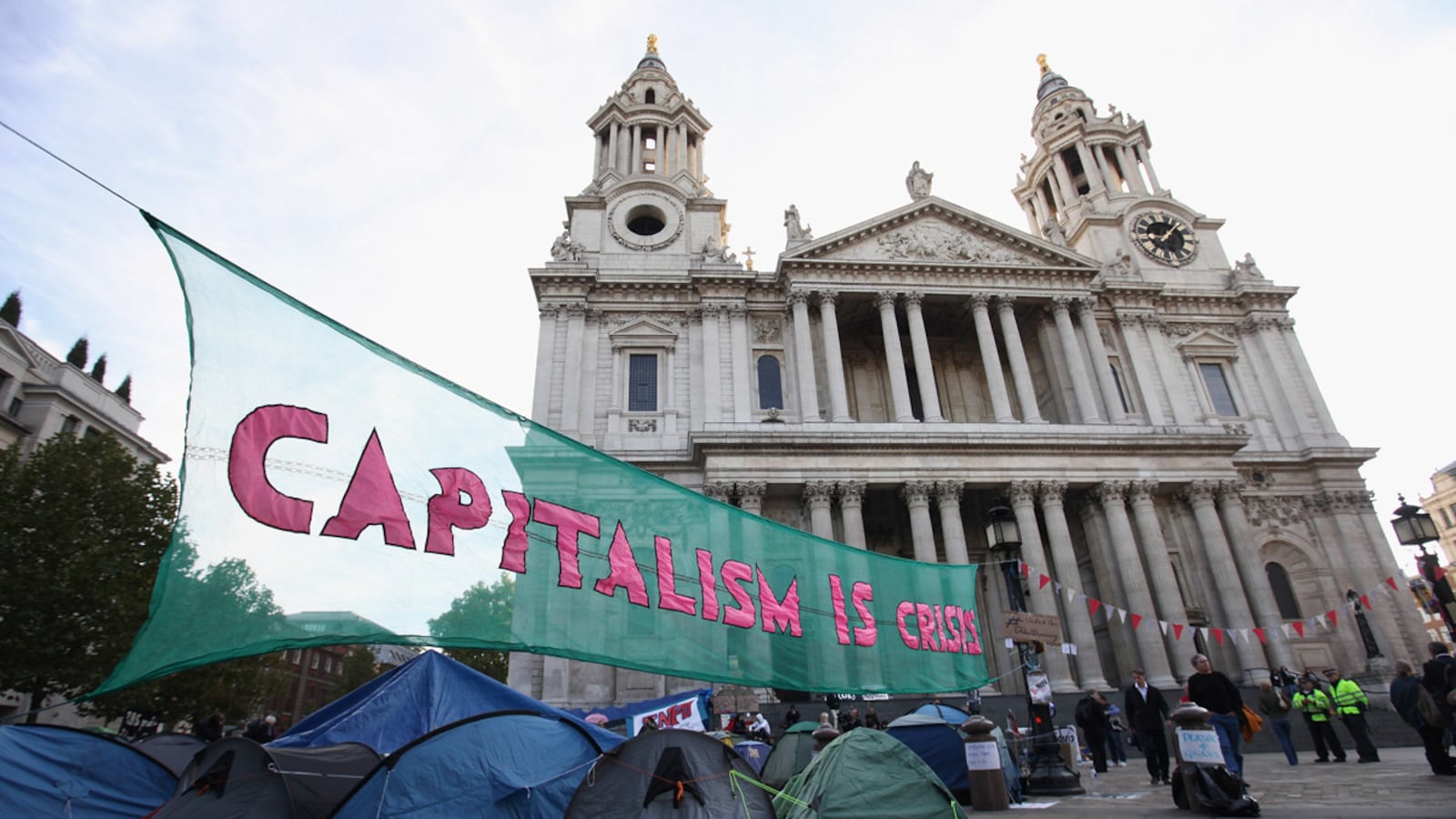 cheats/2011/10/27/st-paul-s-priest-resigns-over-occupy-london/st-pauls-cathedral-closes-protests-london-cheat_arr7ke