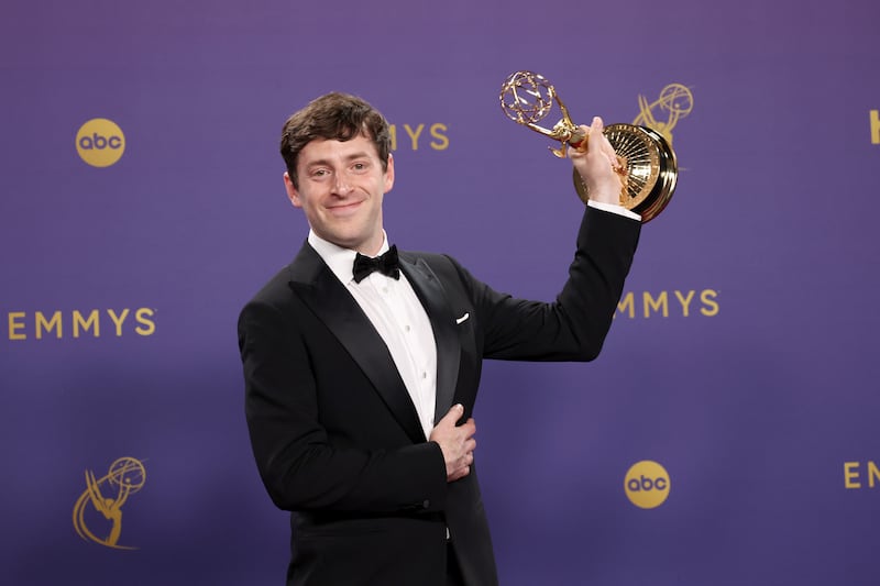 Alex Edelman, winner of the Outstanding Writing for a Variety Special for “Alex Edelman: Just for Us”, poses in the press room during the 76th Primetime Emmy Awards