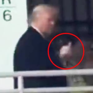 Donald Trump gives middle finger to worker at Ford Plant.