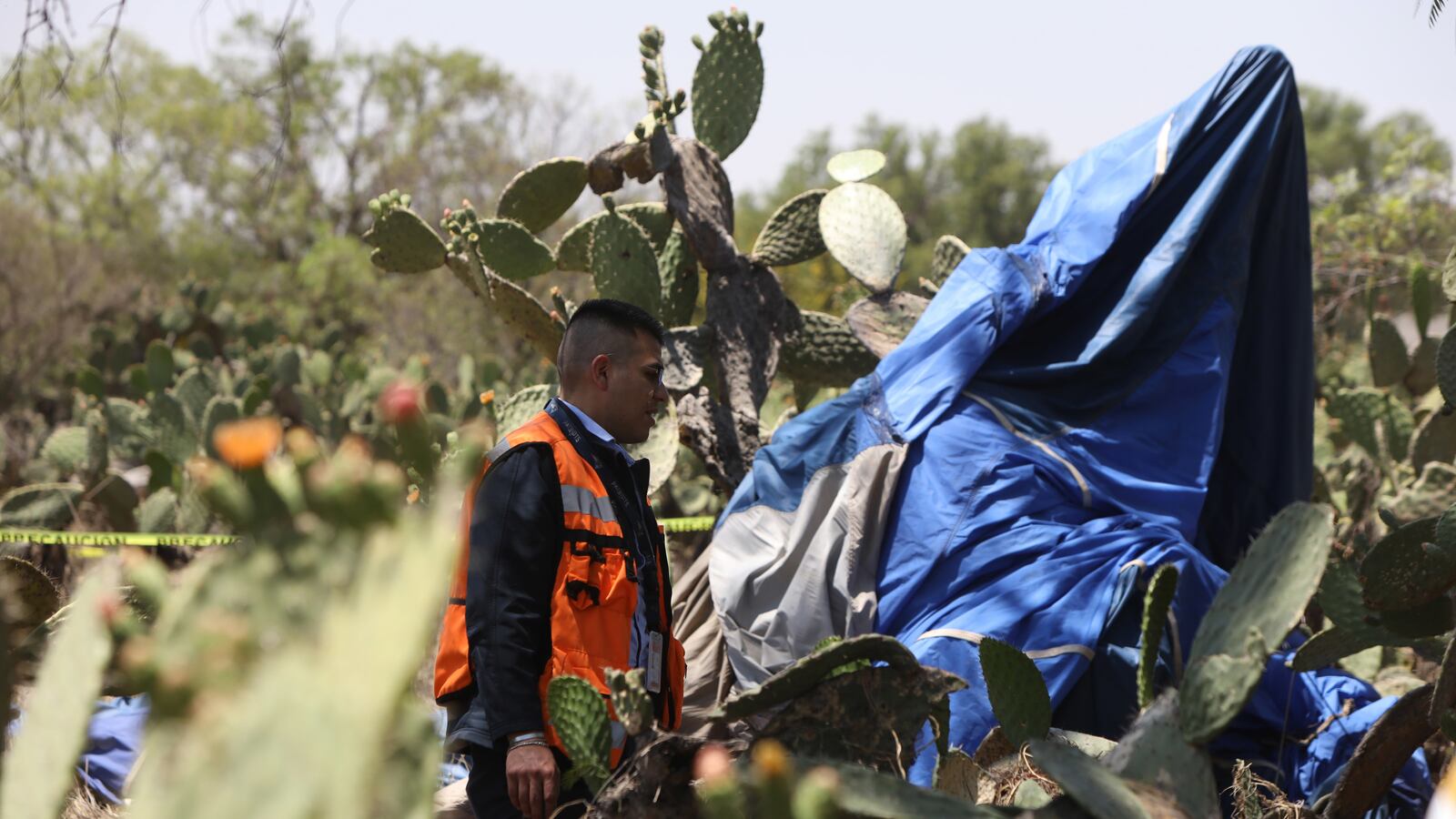 National Guard and Experts investigate the crash area, where a hot air balloon caught fire in mid-flight in the Teotihuacan archaeological zone