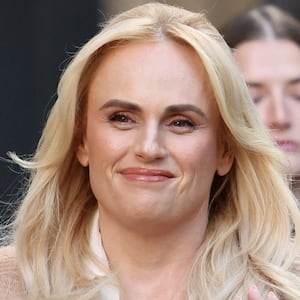 Actor Rebel Wilson waves as she arrives at court on the first day of a nine-day defamation hearing between Charlotte MacInnes and Rebel Wilson, in Sydney, Australia, April 20, 2026. REUTERS/Hollie Adams
