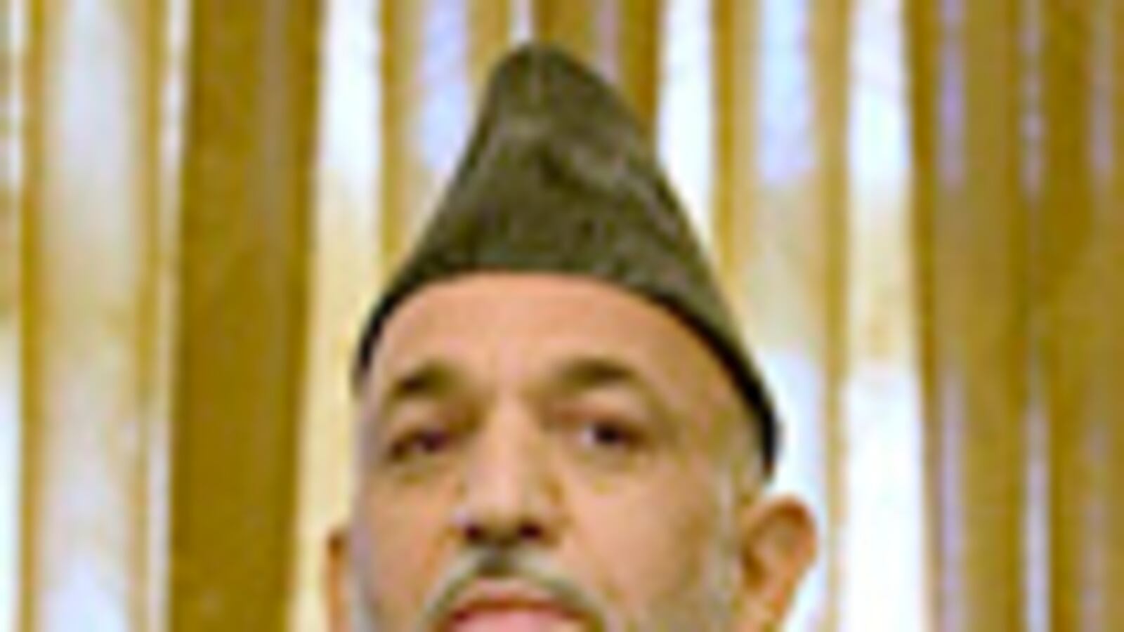 cheats/2009/11/01/pressure-for-karzai-to-skip-runoff/posner-karzai-brothers-02_ln7izw