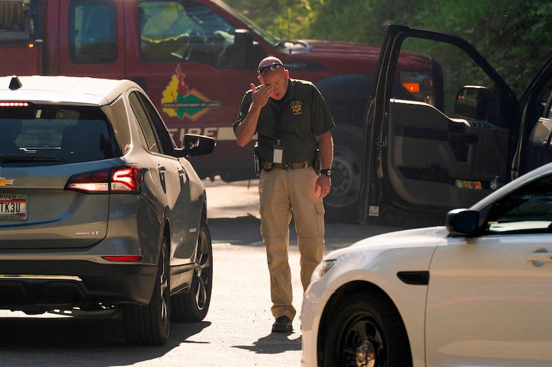 Law enforcement personnel respond near the area where two firefighters were shot dead while responding to a fire and the body of a man was later found with a gun nearby in the Canfield Mountain area outside Coeur d’Alene, Idaho, U.S. June 30, 2025.  REUTERS/David Ryder     TPX IMAGES OF THE DAY