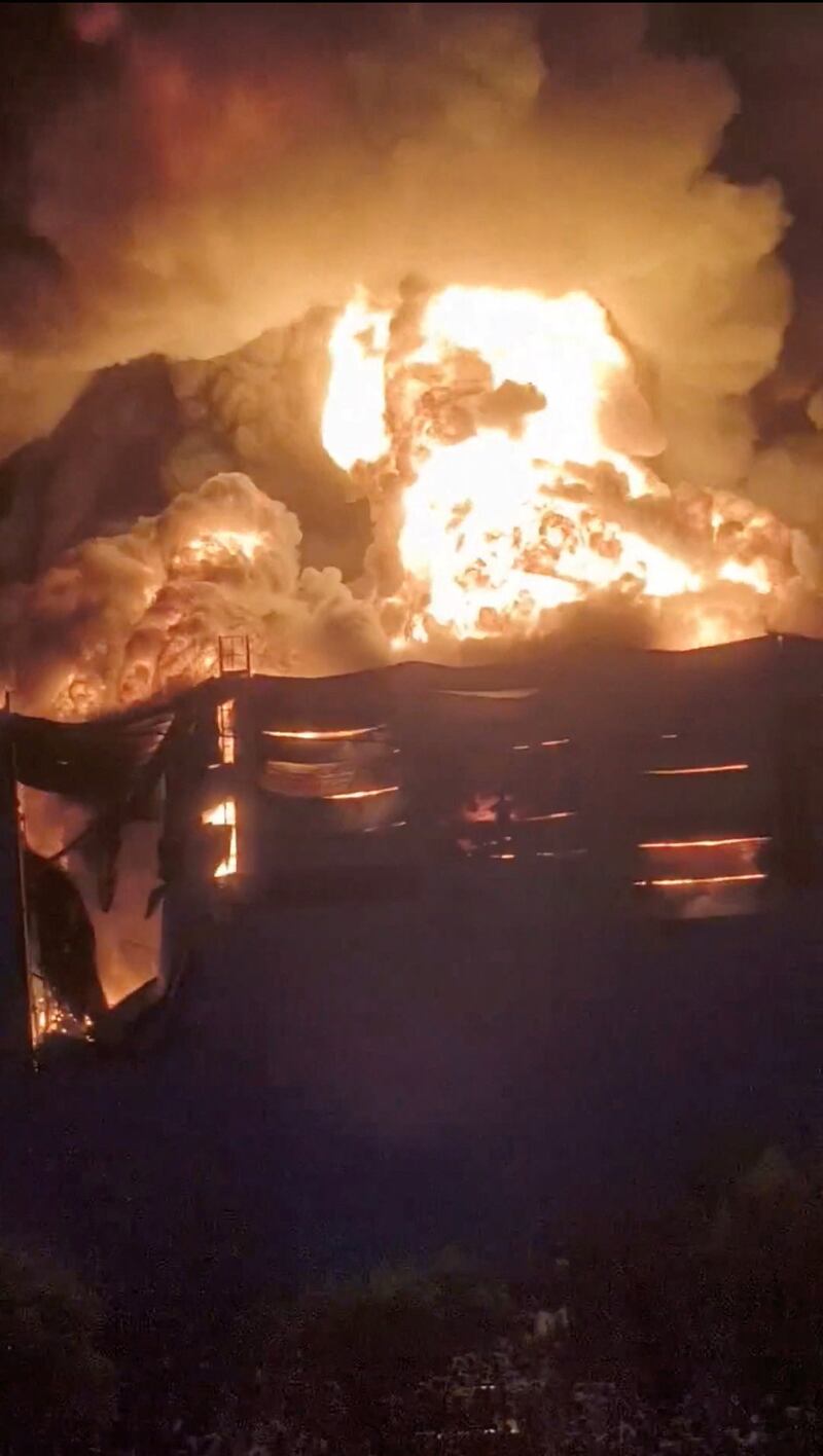Smoke rises from fire at logistics hub of top Russian online retailer Wildberries.